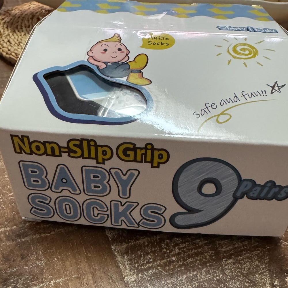 Non-Slip Grip Baby Socks - 9 Pairs. Black. New in box

Comes with laundry bag.